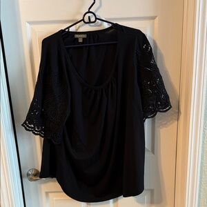 Plus size top. New never worn. No tags. Simple top with detailed  sleeves.